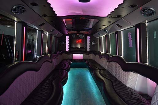 Party bus interior with built-in bar area